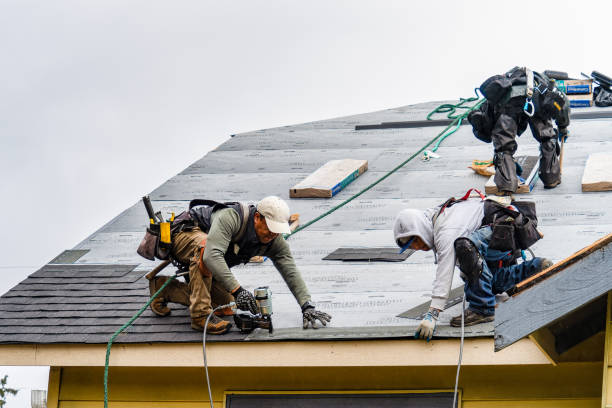 Professional Gutter Installation technician working in Purchase, NY